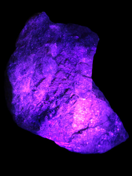 Natural Rhodonite specimen 120*81*50mm 700g in UV light - Rocks and Things Store