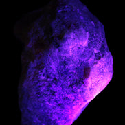 Natural Rhodonite specimen 120*81*50mm 700g in UV light - Rocks and Things Store