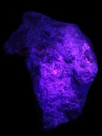 Natural Rhodonite specimen 120*81*50mm 700g in UV light - Rocks and Things Store