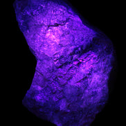 Natural Rhodonite specimen 120*81*50mm 700g in UV light - Rocks and Things Store