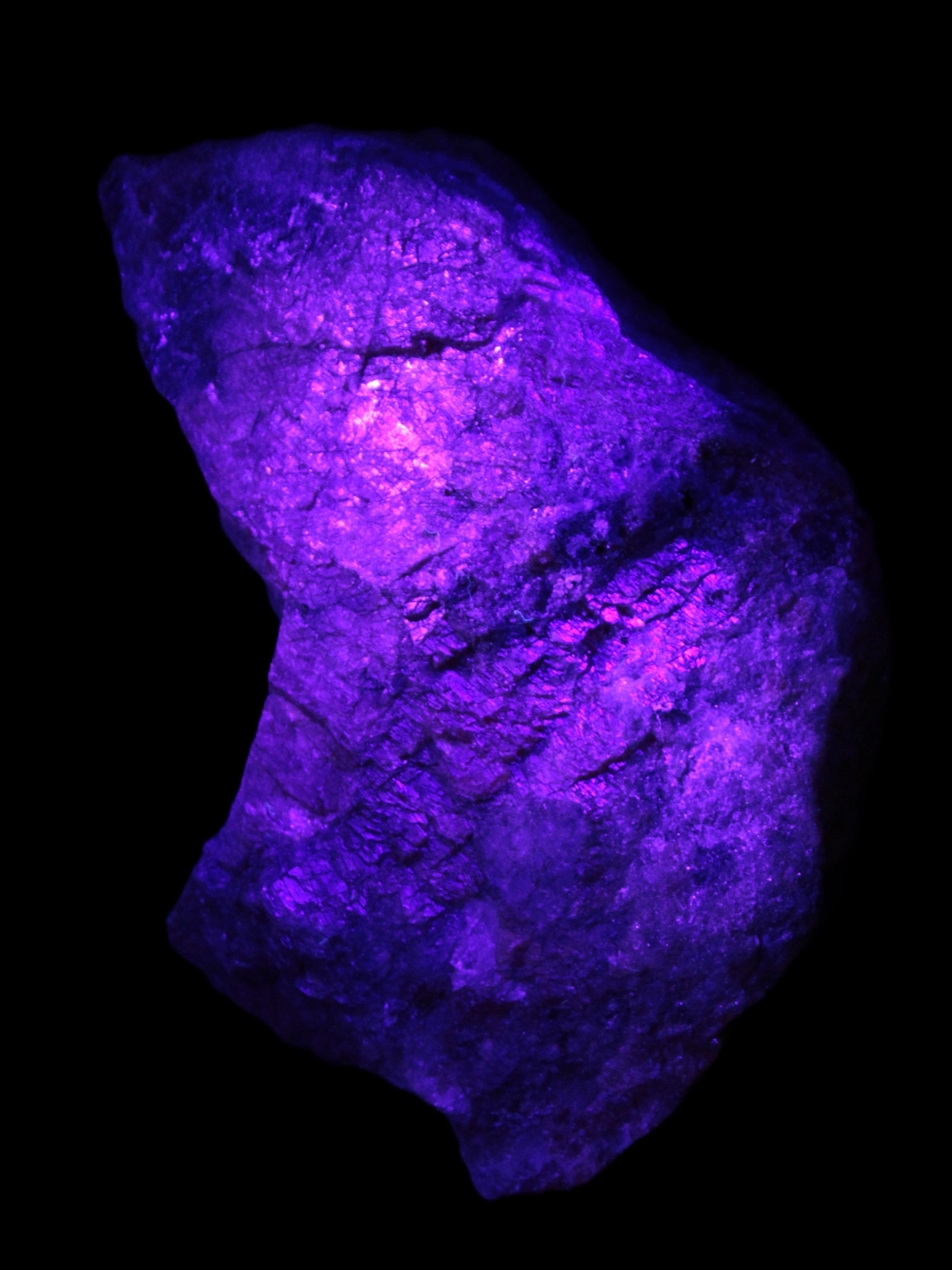 Natural Rhodonite specimen 120*81*50mm 700g in UV light - Rocks and Things Store