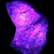 Natural Rhodonite specimen 120*81*50mm 700g in UV light - Rocks and Things Store