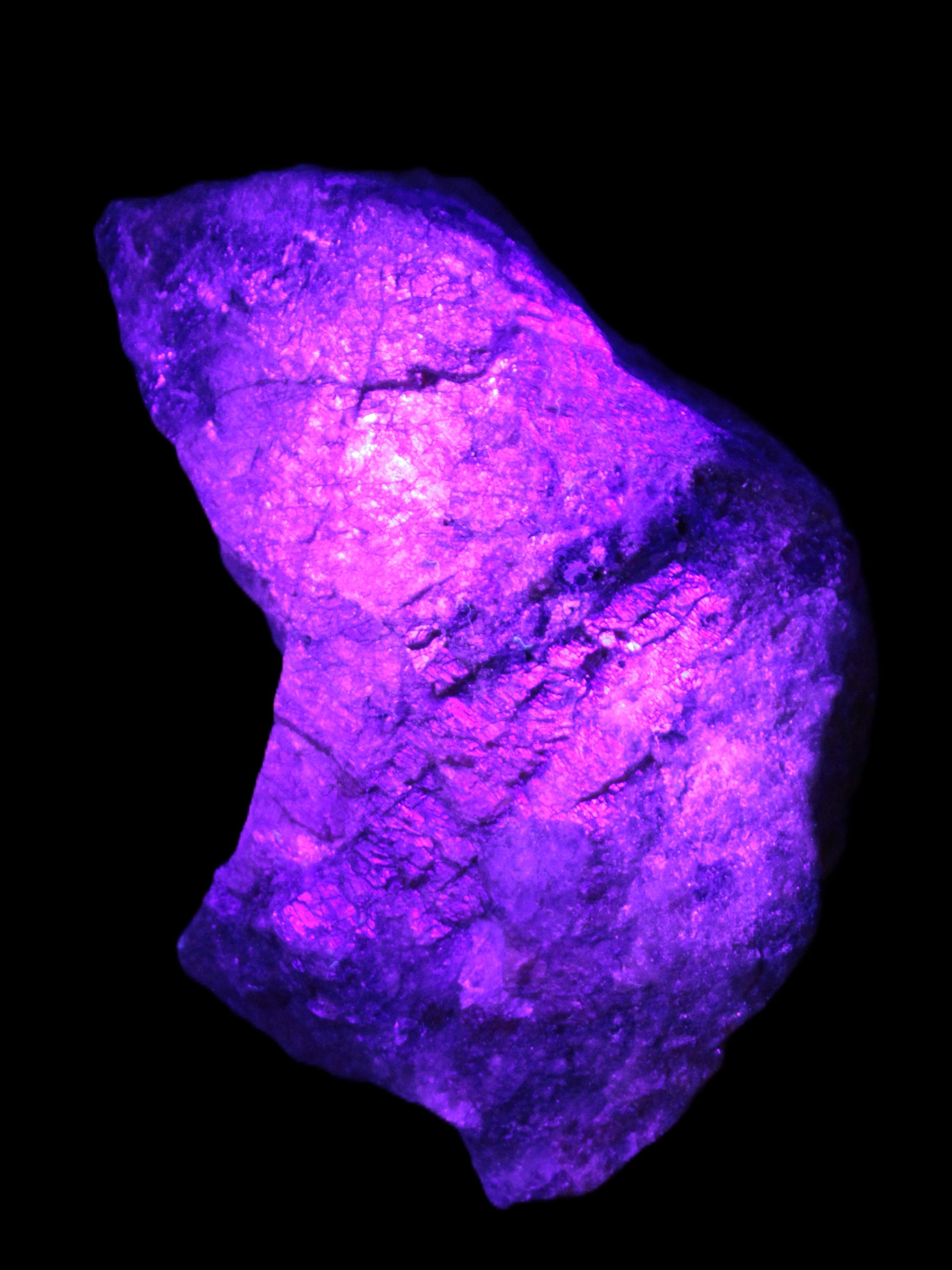 Natural Rhodonite specimen 120*81*50mm 700g in UV light - Rocks and Things Store