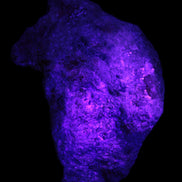 Natural Rhodonite specimen 120*81*50mm 700g in UV light - Rocks and Things Store