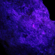 Natural Rhodonite specimen 120*81*50mm 700g in UV light - Rocks and Things Store