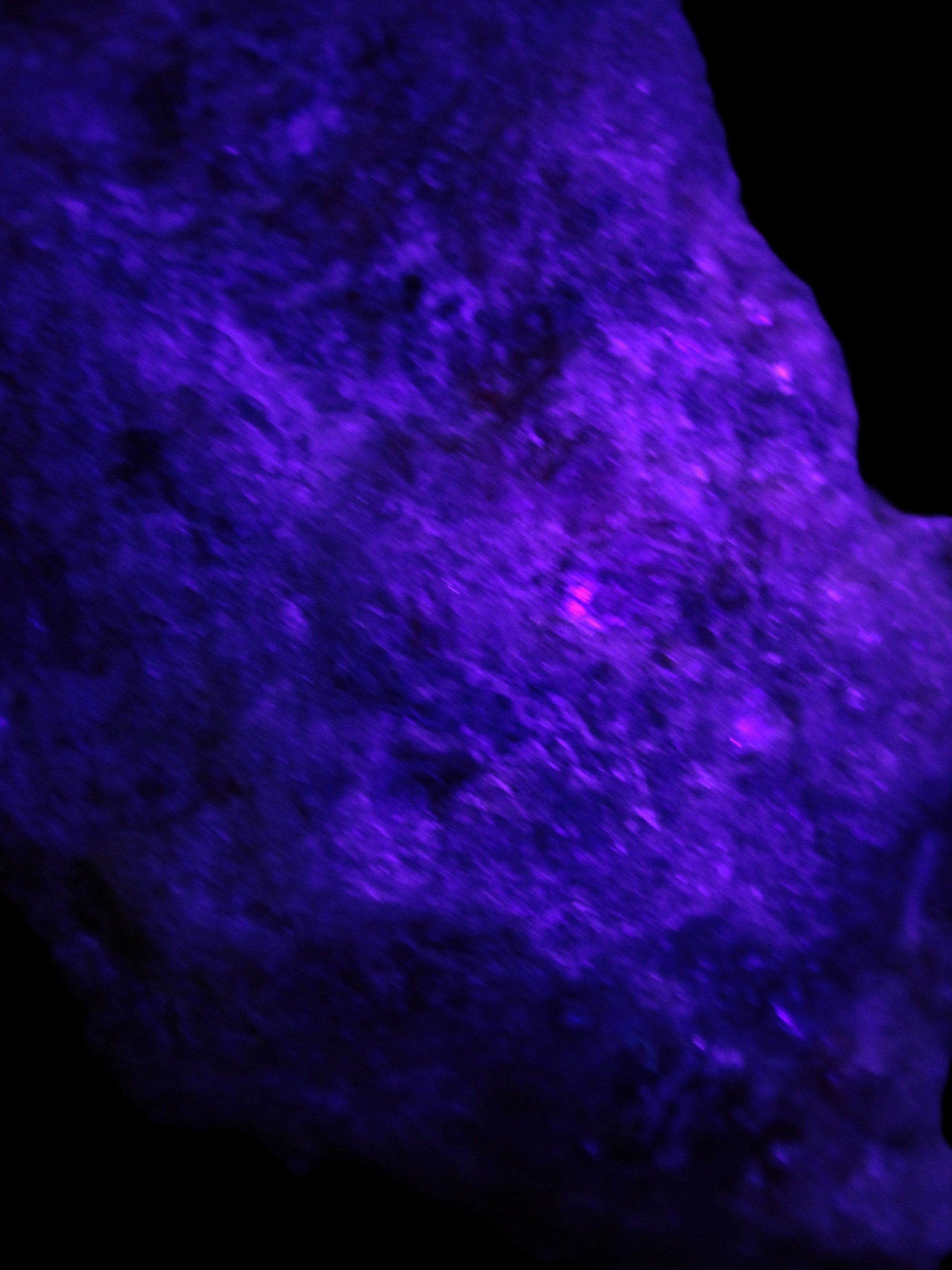 Natural Rhodonite specimen 120*81*50mm 700g in UV light - Rocks and Things Store