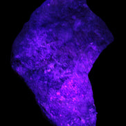 Natural Rhodonite specimen 120*81*50mm 700g in UV light - Rocks and Things Store