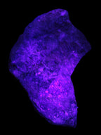 Natural Rhodonite specimen 120*81*50mm 700g in UV light - Rocks and Things Store