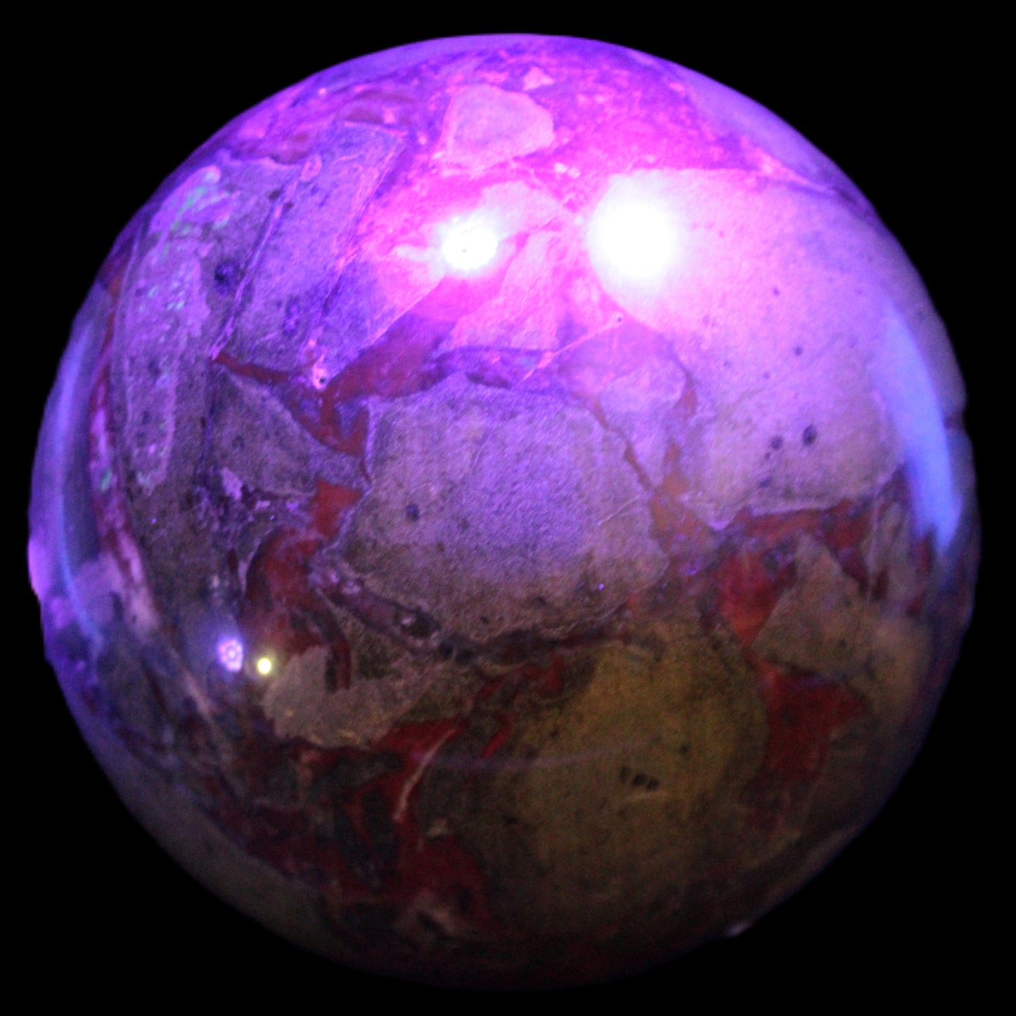 Huge Dragons Blood Stone sphere 164mm 7040g in UV light