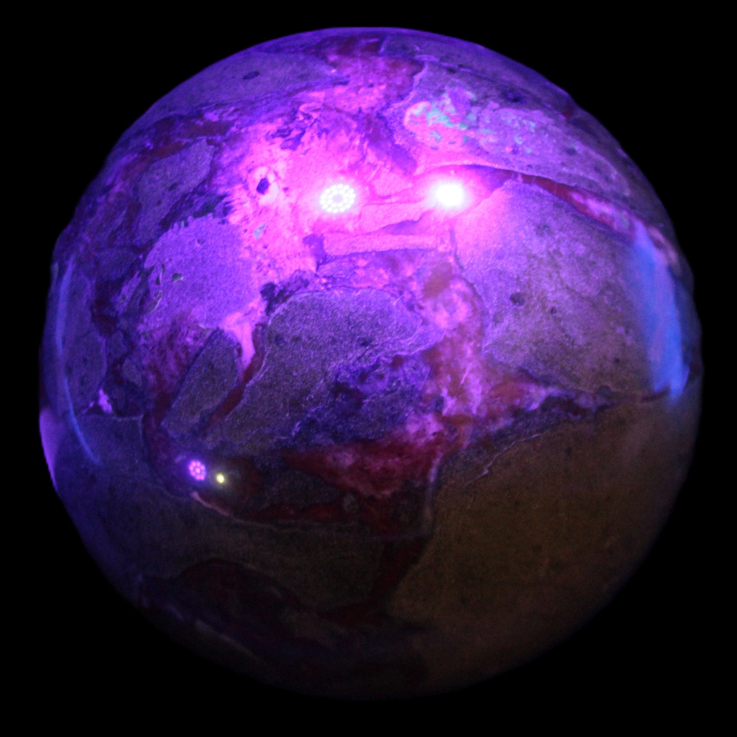 Huge Dragons Blood Stone sphere 164mm 7040g in UV light