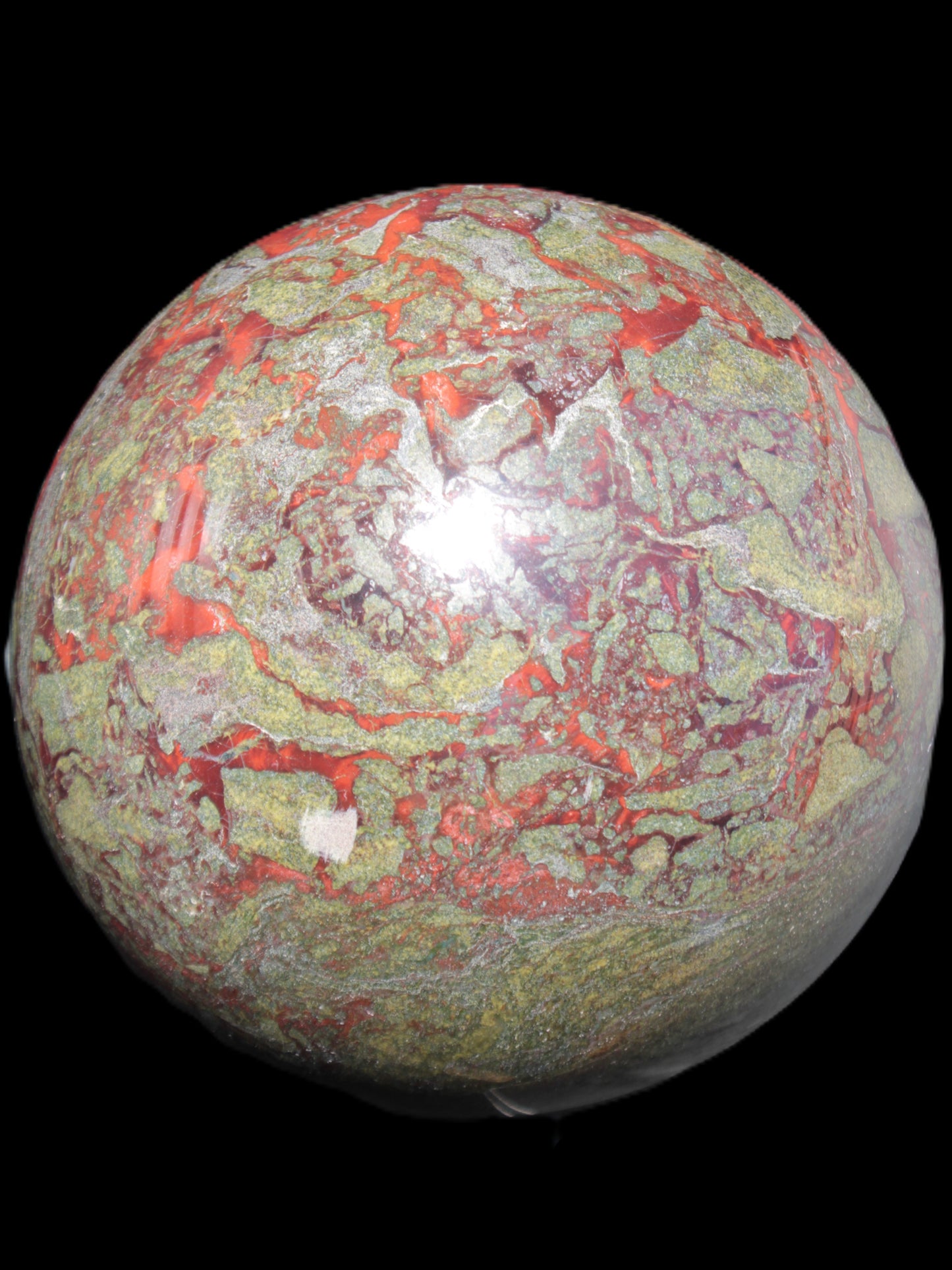 Huge Dragons Blood Stone sphere 164mm 7040g in sunlight