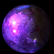 Huge Dragons Blood Stone sphere 164mm 7040g in UV light