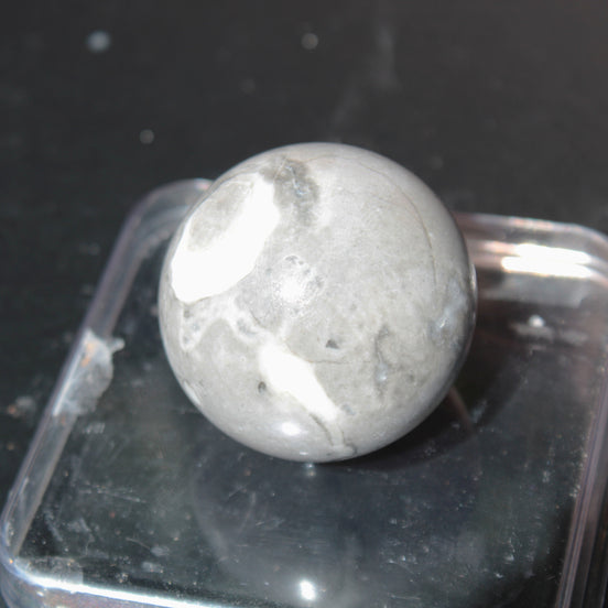 Thousand Eye Stone sphere 41mm 96g in sunlight - Rocks and Things Store