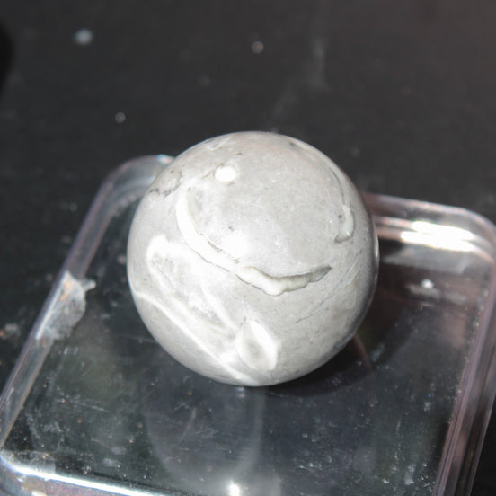 Thousand Eye Stone sphere 41mm 96g in sunlight - Rocks and Things Store