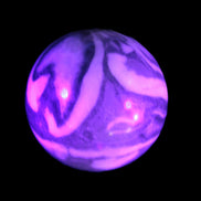 Thousand Eye Stone sphere 41mm 108g in UV light