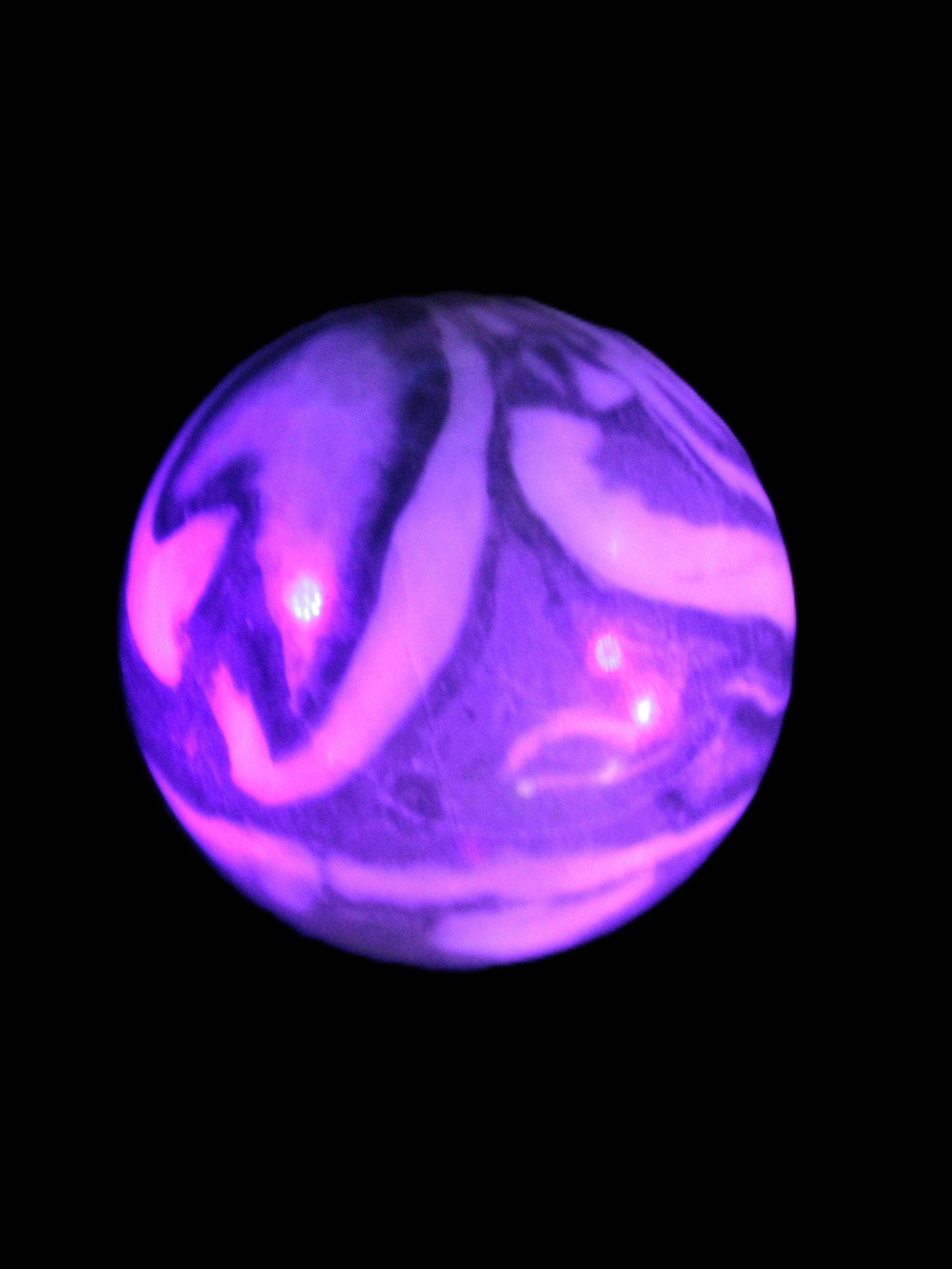 Thousand Eye Stone sphere 41mm 108g in UV light