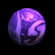 Thousand Eye Stone sphere 41mm 108g in UV light