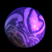 Thousand Eye Stone sphere 41mm 108g in UV light - Rocks and Things Store