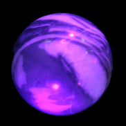 Thousand Eye Stone sphere 41mm 108g in UV light - Rocks and Things Store
