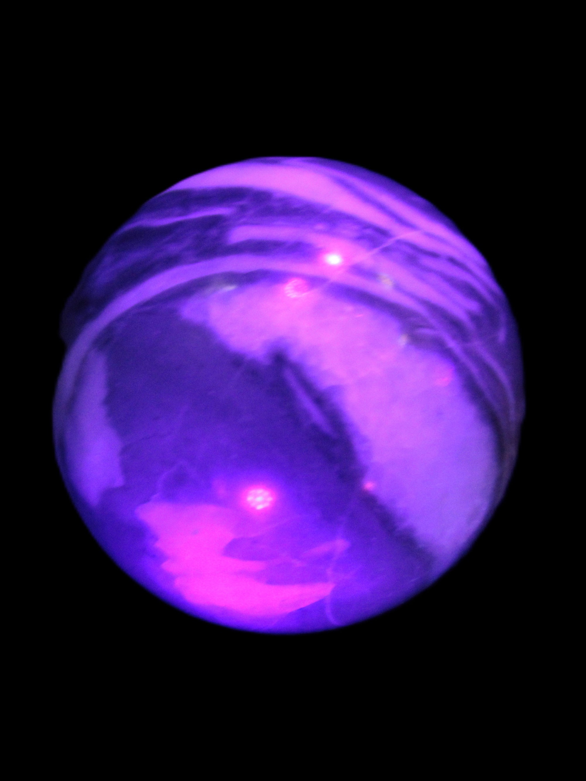 Thousand Eye Stone sphere 41mm 108g in UV light - Rocks and Things Store