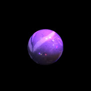 Thousand Eye Stone sphere 41mm 100g in UV light - Rocks and Things Store