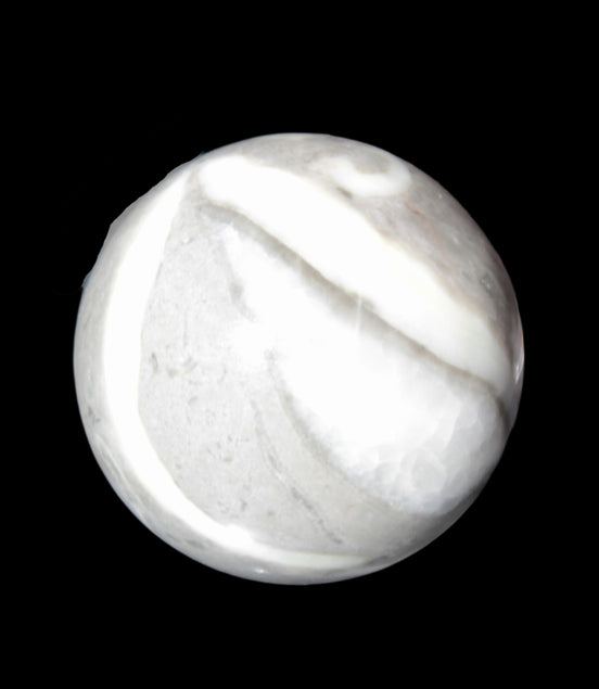 Thousand Eye Stone sphere 41mm 100g in sunlight - Rocks and Things Store