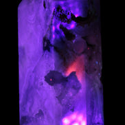 Pink Sakura Agate with geode caves obelisk 40*32*106mm 245g in UV light