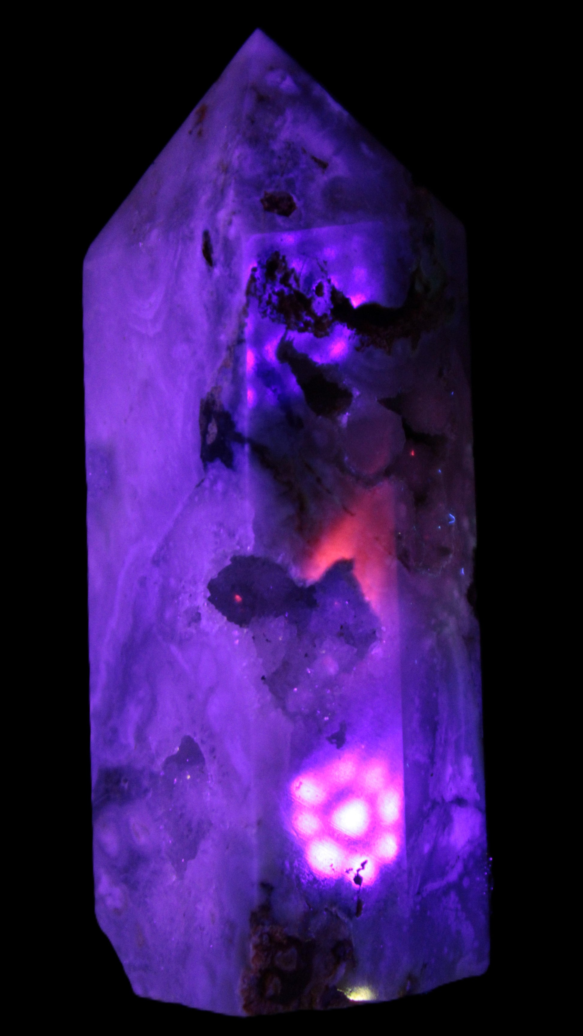 Pink Sakura Agate with geode caves obelisk 40*32*106mm 245g in UV light