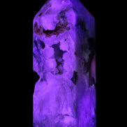 Pink Sakura Agate with geode caves obelisk 40*32*106mm 245g in UV light -  Rocks and Things Store