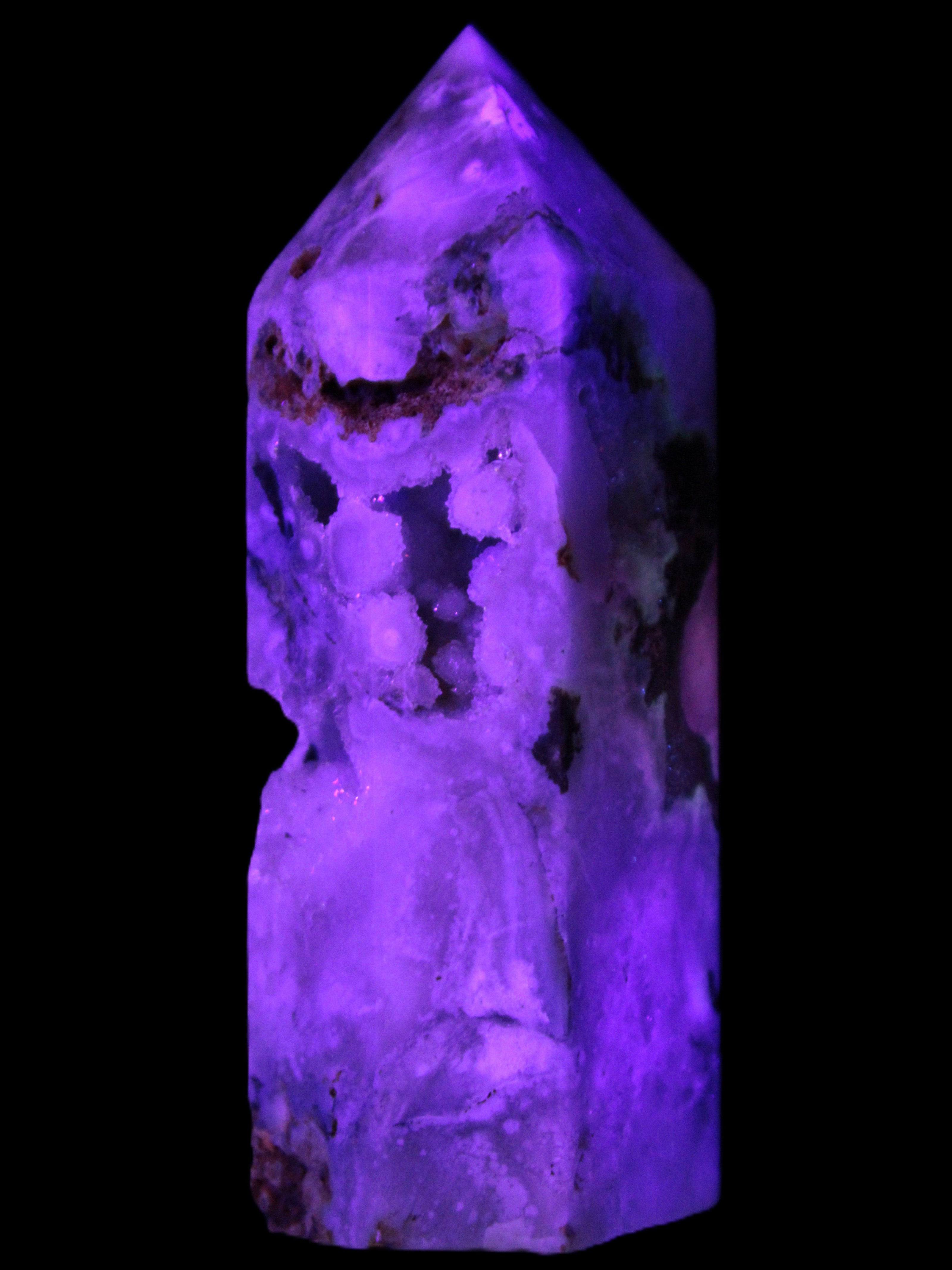 Pink Sakura Agate with geode caves obelisk 40*32*106mm 245g in UV light -  Rocks and Things Store