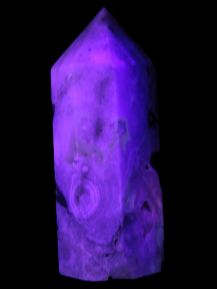 Pink Sakura Agate with geode caves obelisk 40*32*106mm 245g in UV light - Rocks and Things Store