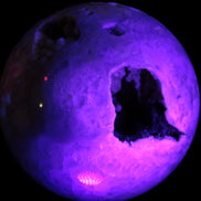 Sakura Agate sphere 97mm 1062g in UV light - Rocks and Things Store