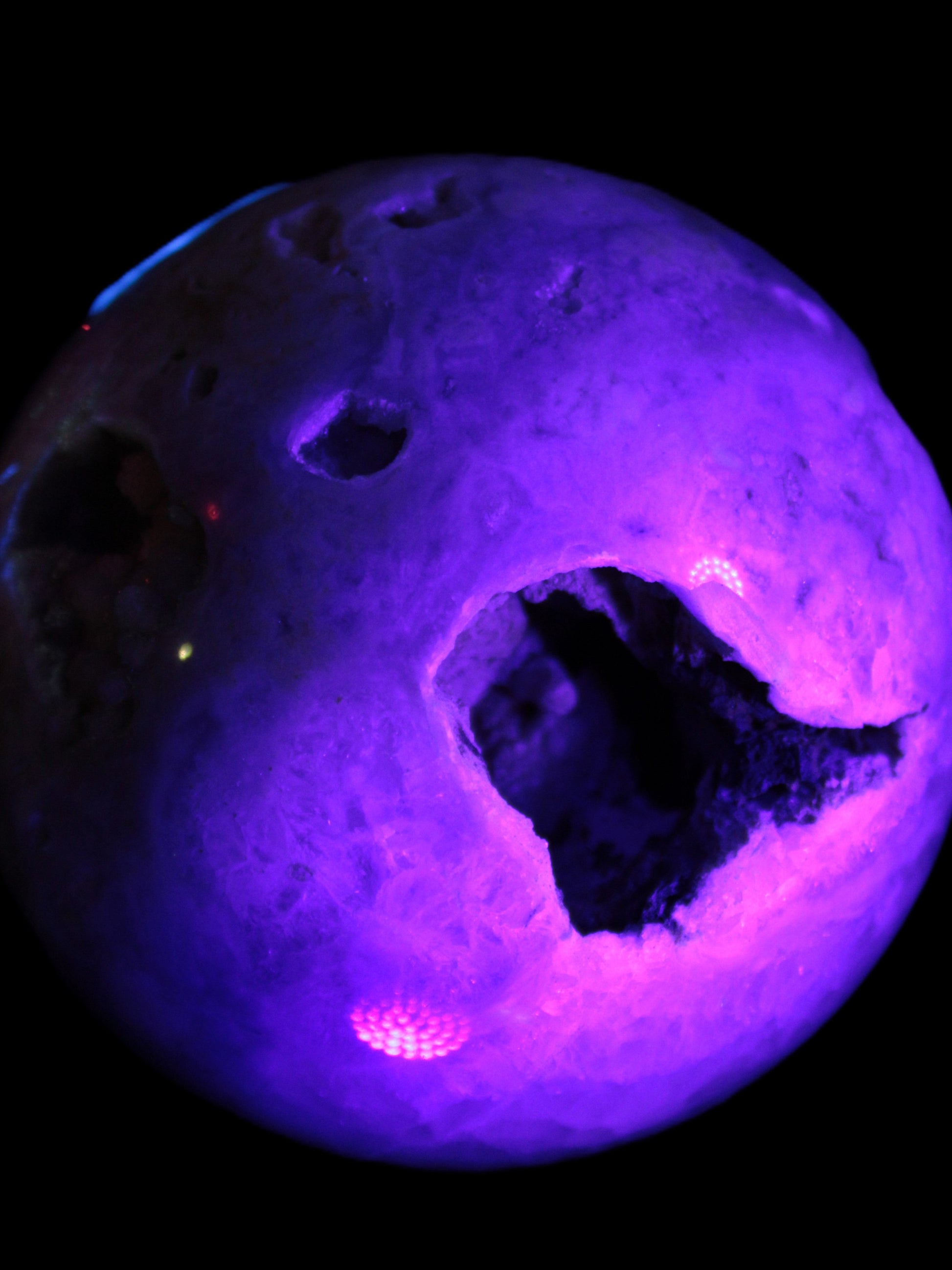 Sakura Agate sphere 97mm 1062g in UV light - Rocks and Things Store