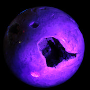 Sakura Agate sphere 97mm 1062g in UV light - Rocks and Things Store