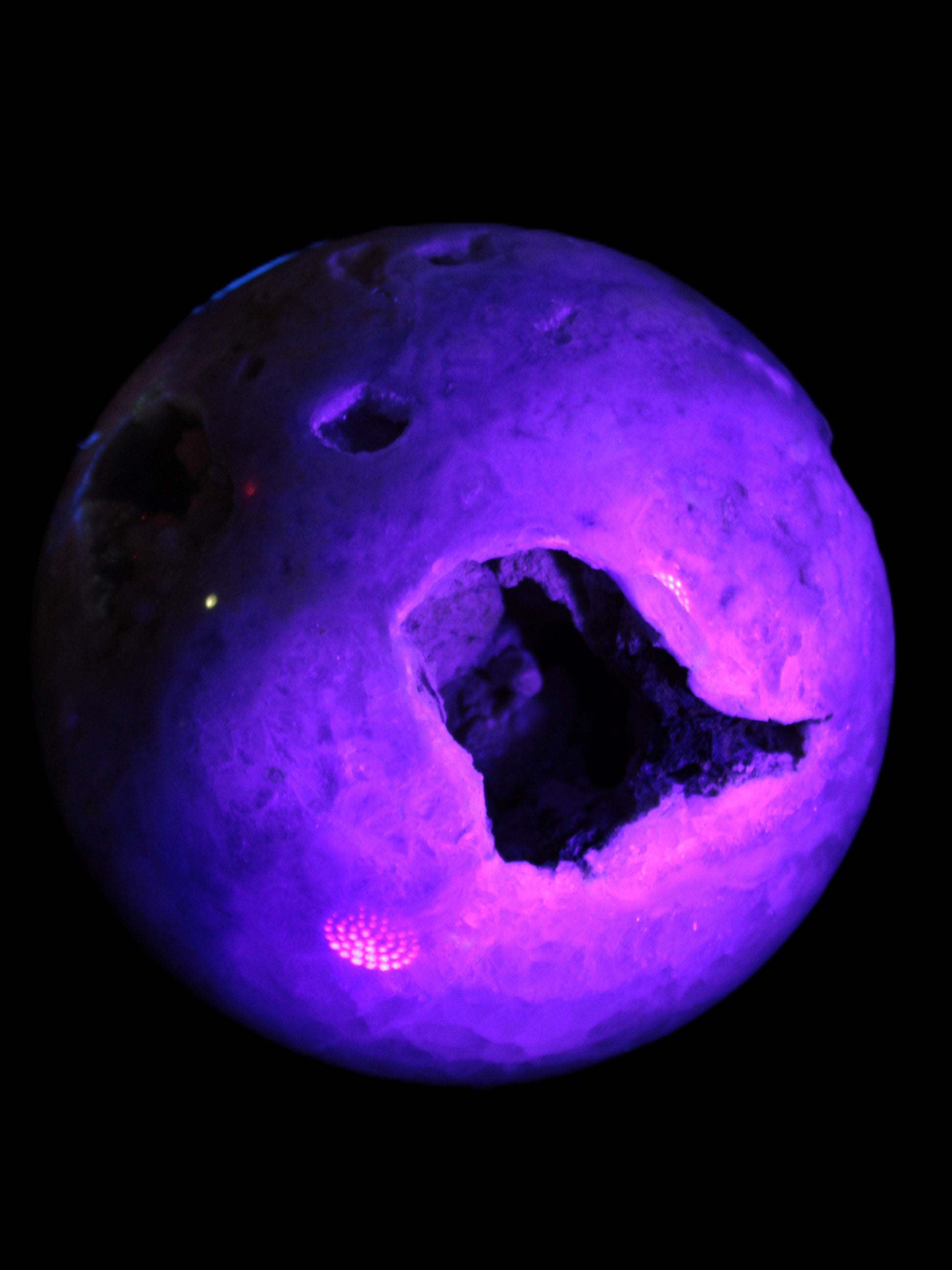 Sakura Agate sphere 97mm 1062g in UV light - Rocks and Things Store