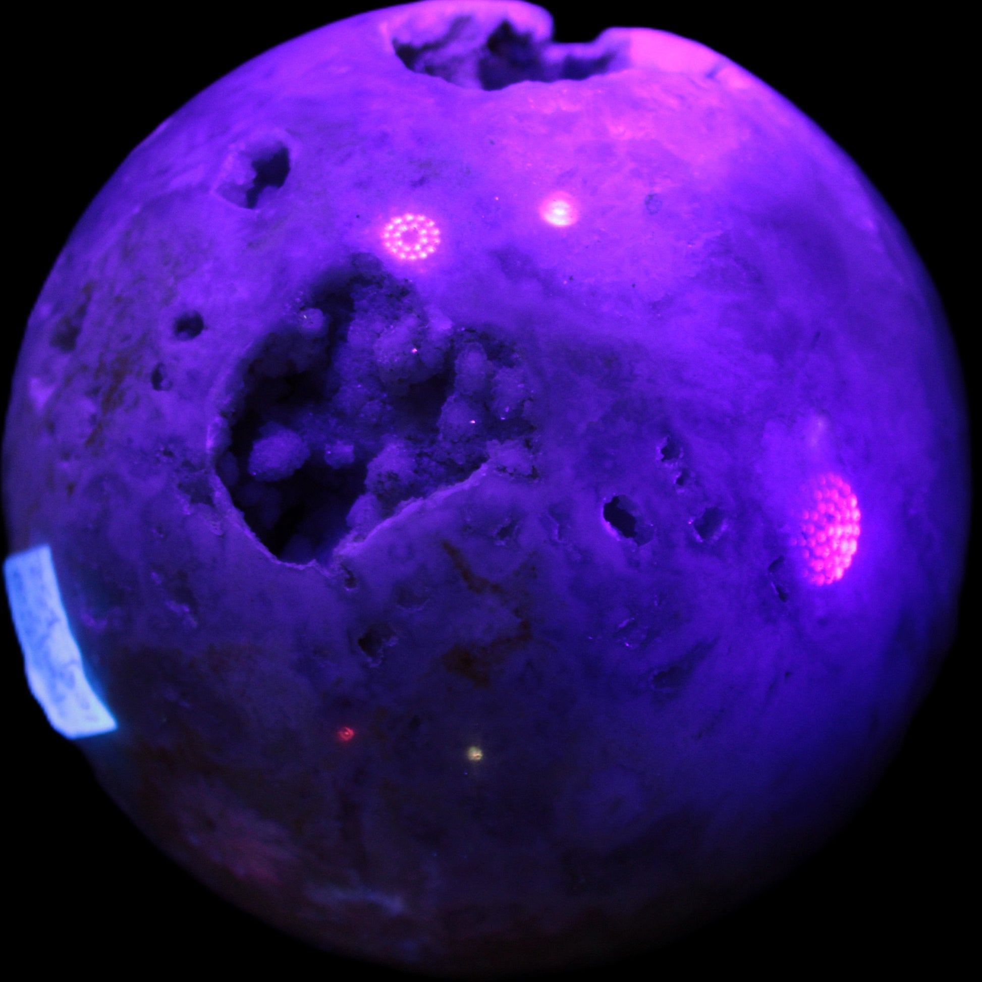 Sakura Agate sphere 97mm 1062g in UV light - Rocks and Things Store