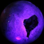 Sakura Agate sphere 97mm 1062g in UV light - Rocks and Things Store