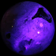 Sakura Agate sphere 97mm 1062g in UV light - Rocks and Things Store