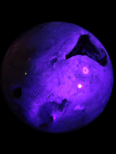 Sakura Agate sphere 97mm 1062g in UV light - Rocks and Things Store