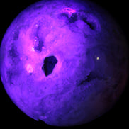 Sakura Agate sphere 97mm 1062g in UV light - Rocks and Things Store