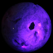 Sakura Agate sphere 97mm 1062g in UV light - Rocks and Things Store