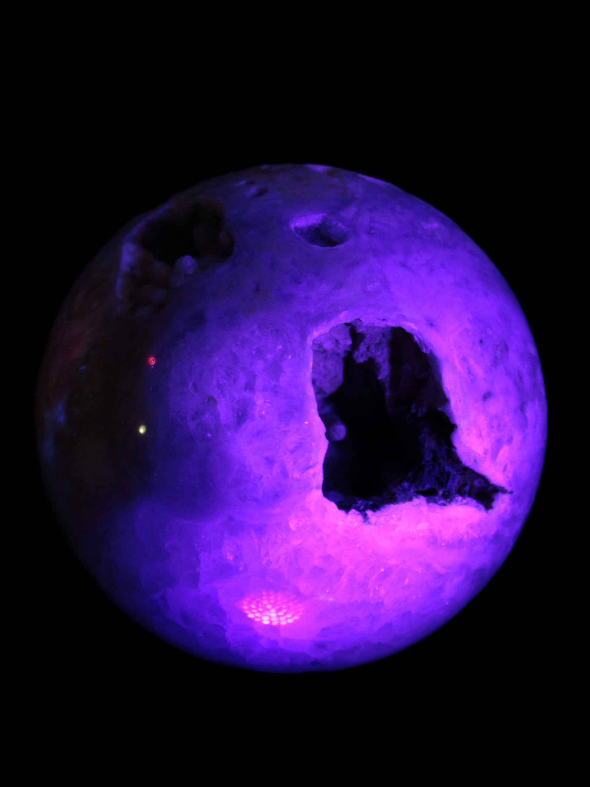 Sakura Agate sphere 97mm 1062g in UV light - Rocks and Things Store