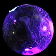Moss Agate sphere 113mm 1878g in UV light - Rocks and Things Store