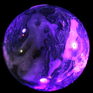 Moss Agate sphere 113mm 1878g in UV light - Rocks and Things Store