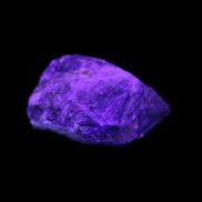 Golden Arusha Quartz raw crystal 14g in UV light