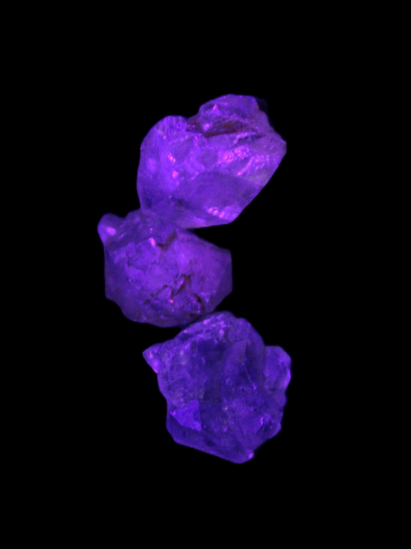 Super Seven Amethyst 3 crystals 12g in  UV light - Rocks and Things Store