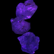 Super Seven Amethyst 3 crystals 12g in  UV light - Rocks and Things Store