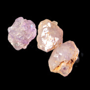 Super Seven Amethyst 3 crystals 12g in sunlight