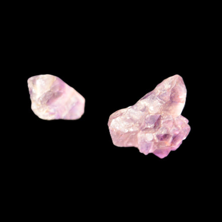 Super Seven Amethyst 2 crystals 11.1g in sunlight