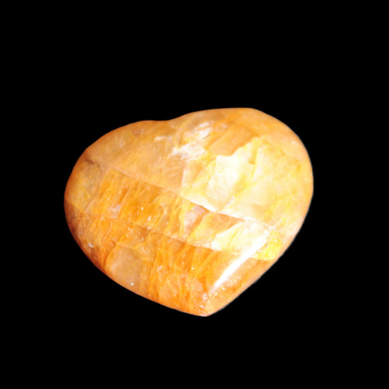 Golden Healer Quartz heart 40*35mm 30g in sunlight - Rocks and Things Store